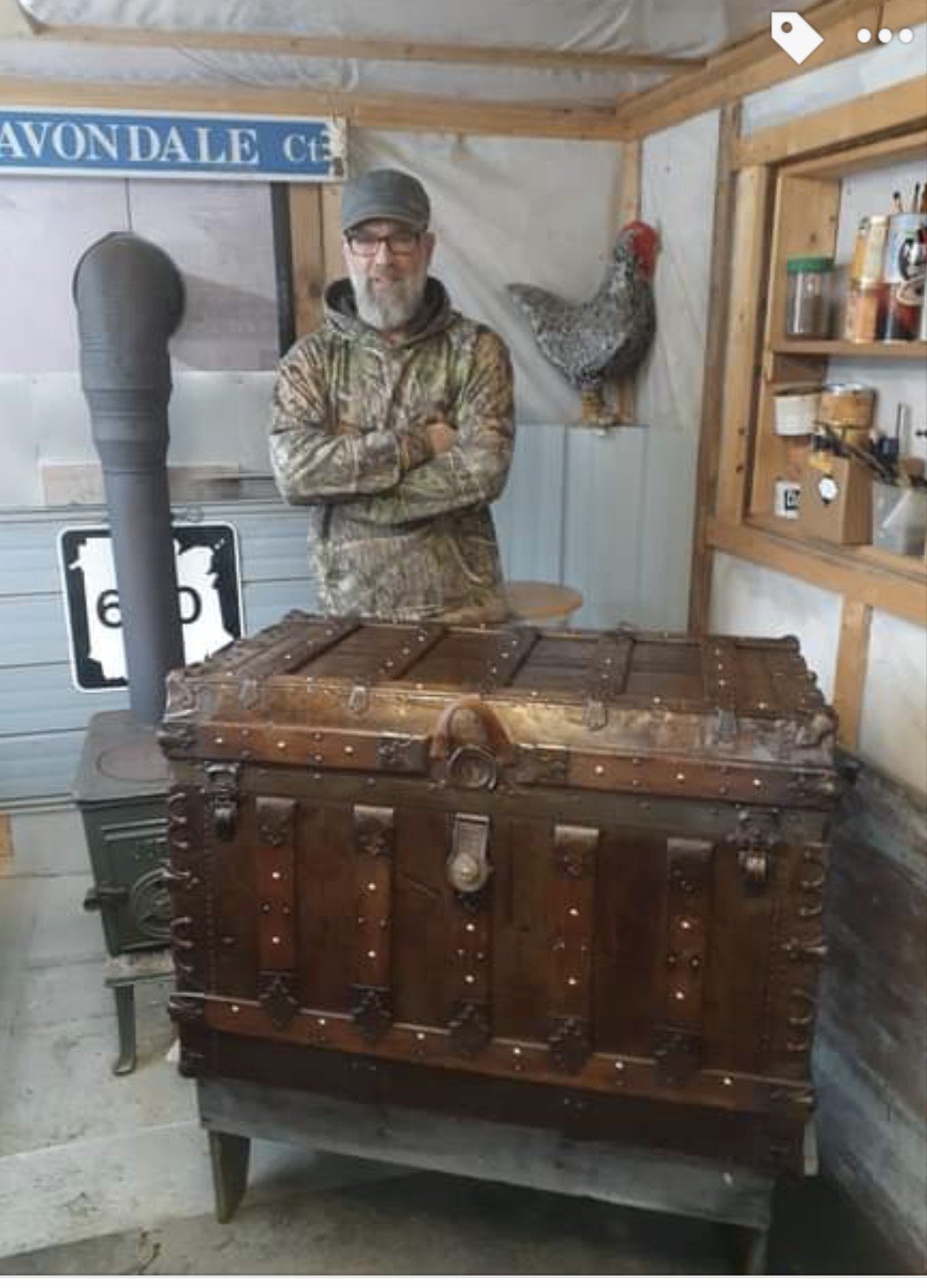 Jarrod Goodrum, in his workshop, with one of his restored chests